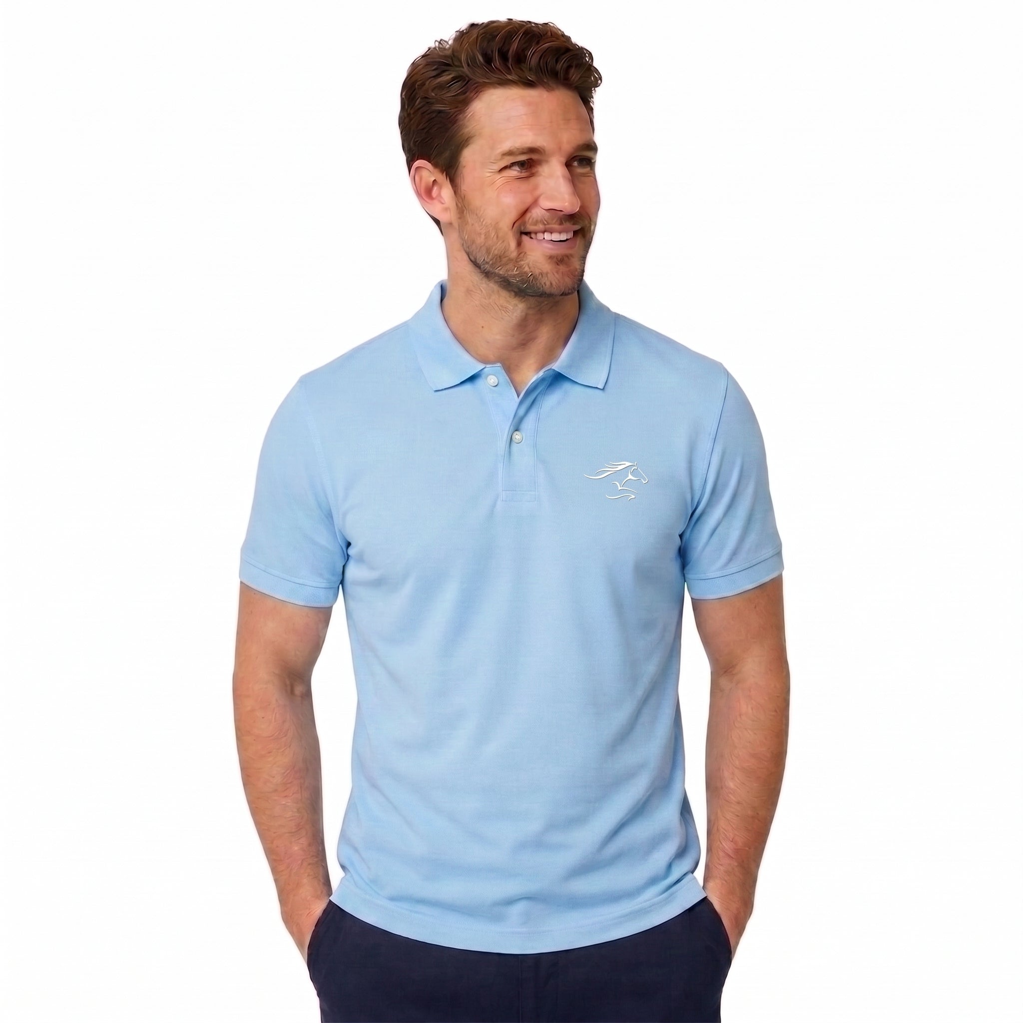 A man wearing a light blue short-sleeve polo shirt with a small white embroidered logo on the left chest, paired with dark navy pants, against a plain white background.