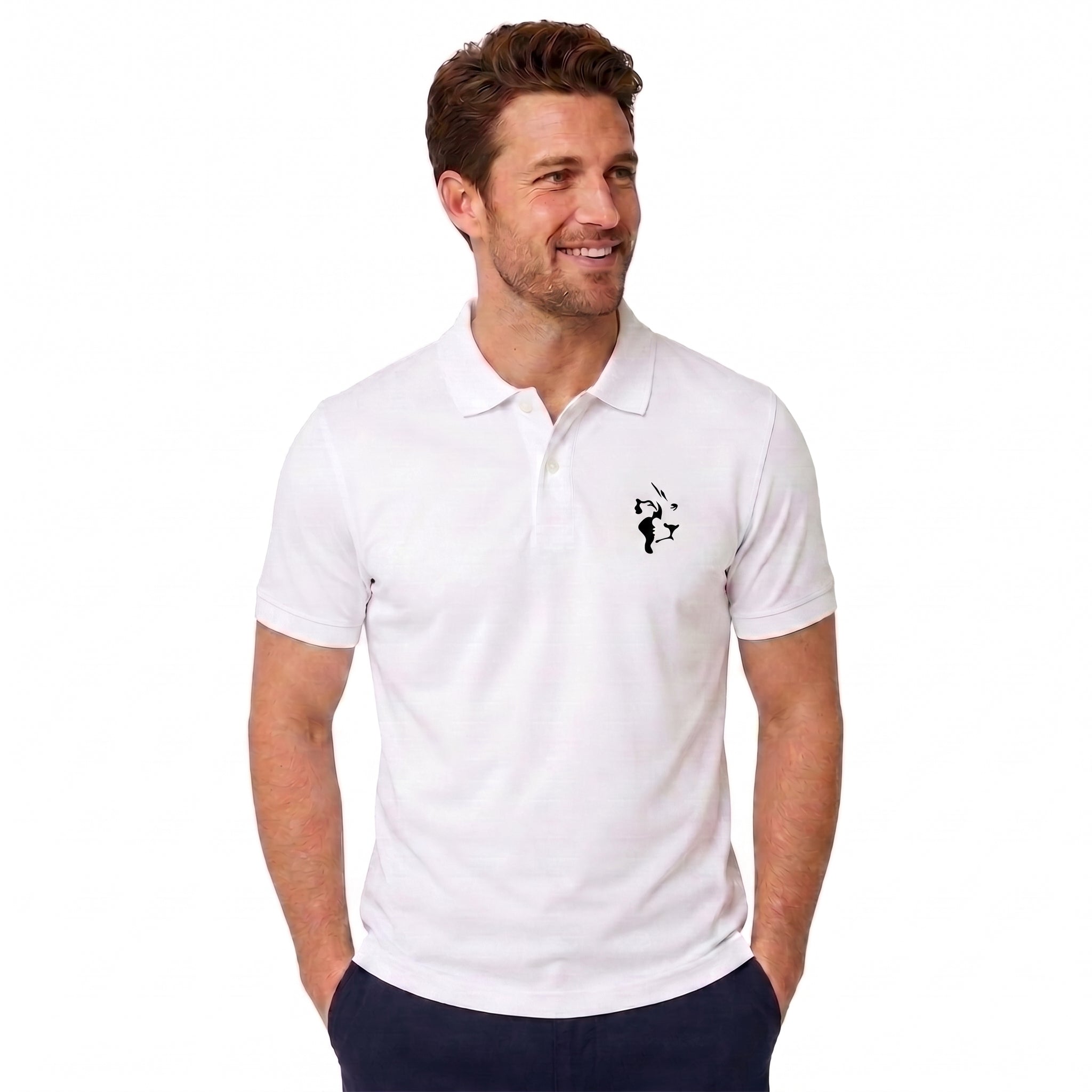 A man wearing a white short-sleeve polo shirt with a small black embroidered logo on the left chest, paired with dark navy pants, set against a plain white background.